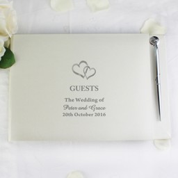 Show details for Hardback Guest Book & Pen Hearts Design Picture of Hardback Guest Book & Pen Hearts Design