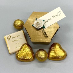 Show details for Ready Filled Gold Silk Hexagonal Favour Picture of Ready Filled Gold Silk Hexagonal Favour