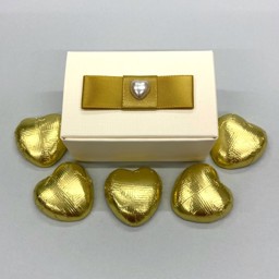 Show details for Ready Filled Ivory Silk Box Gold Favour Picture of Ready Filled Ivory Silk Box Gold Favour