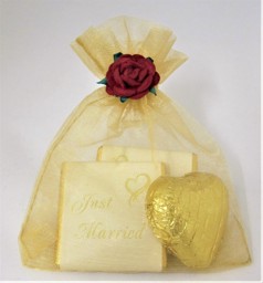 Show details for Gold Voile Bag Chocolate Favour Picture of Gold Voile Bag Chocolate Favour